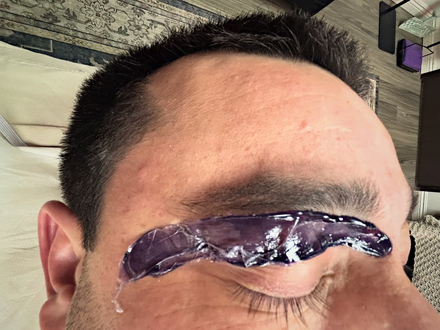 Wax on an eyebrow during a brow wax